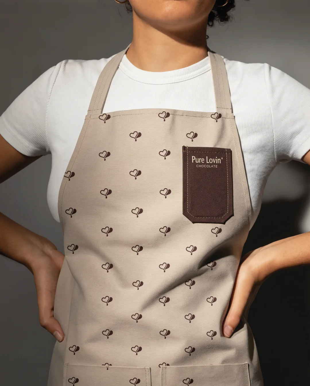 Pure Lovin' Chocolate rebrand by Round 3, apron