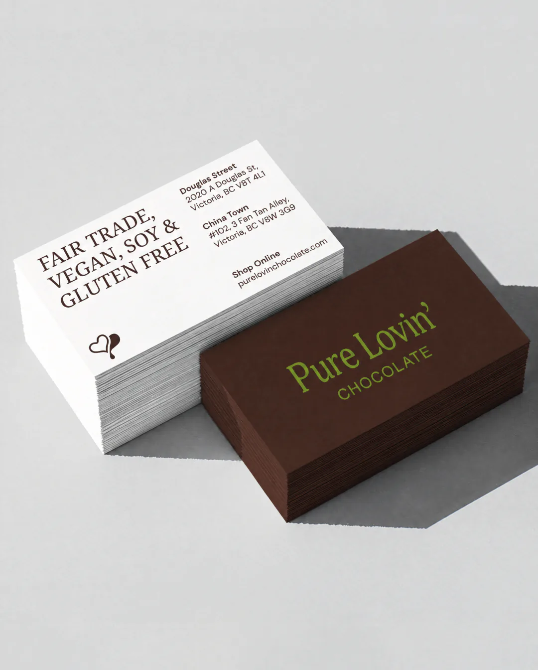 Pure Lovin' Chocolate rebrand by Round 3, business cards