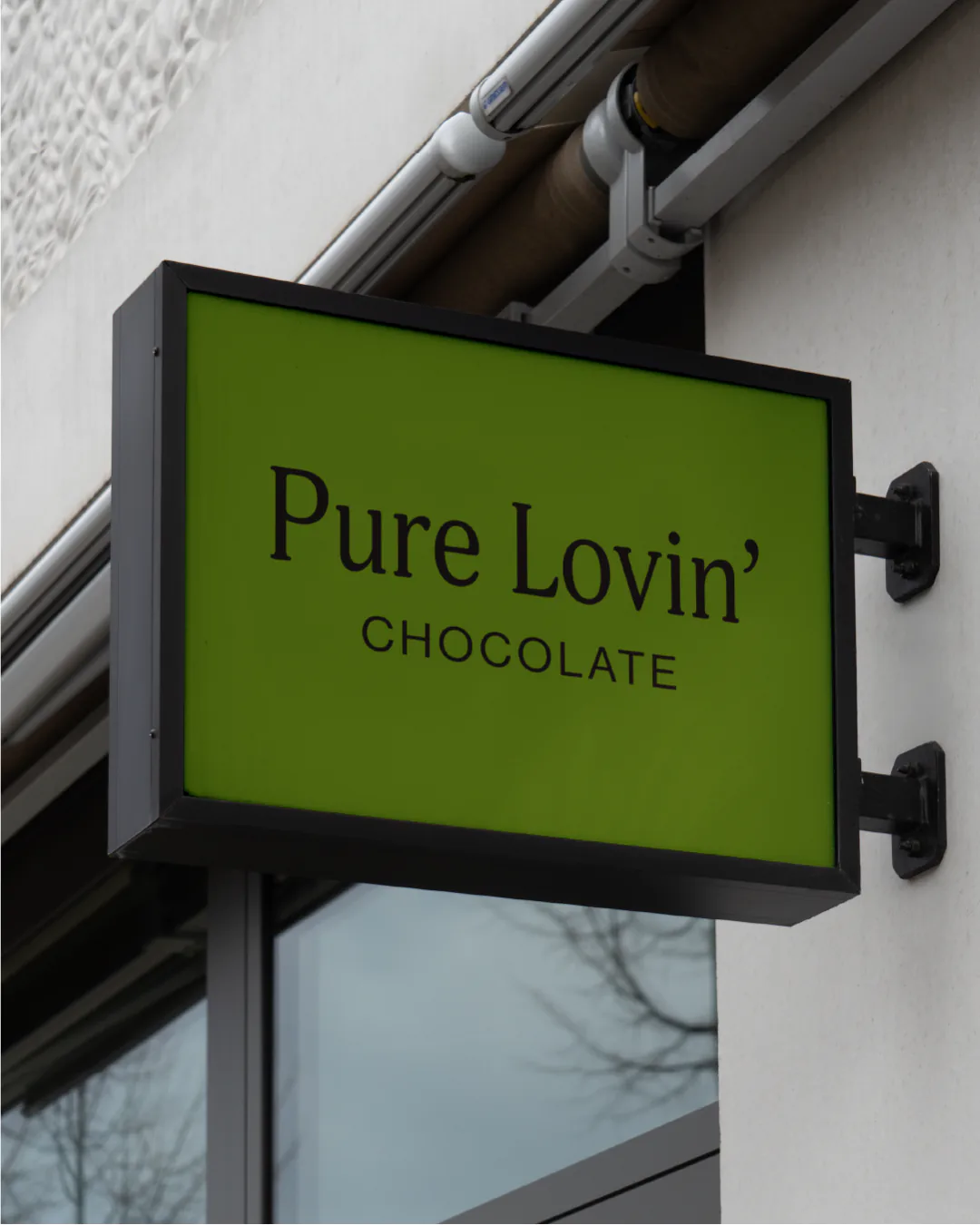 Pure Lovin' Chocolate rebrand by Round 3, shop sign